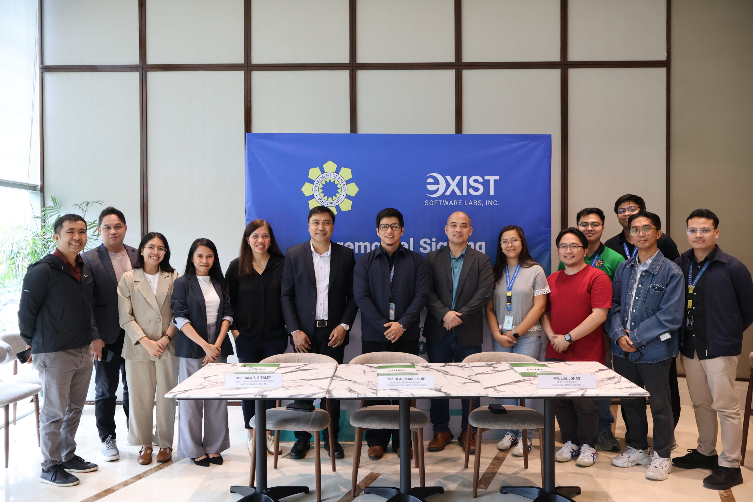 group picture of exist software labs inc team and department of energy philippines team